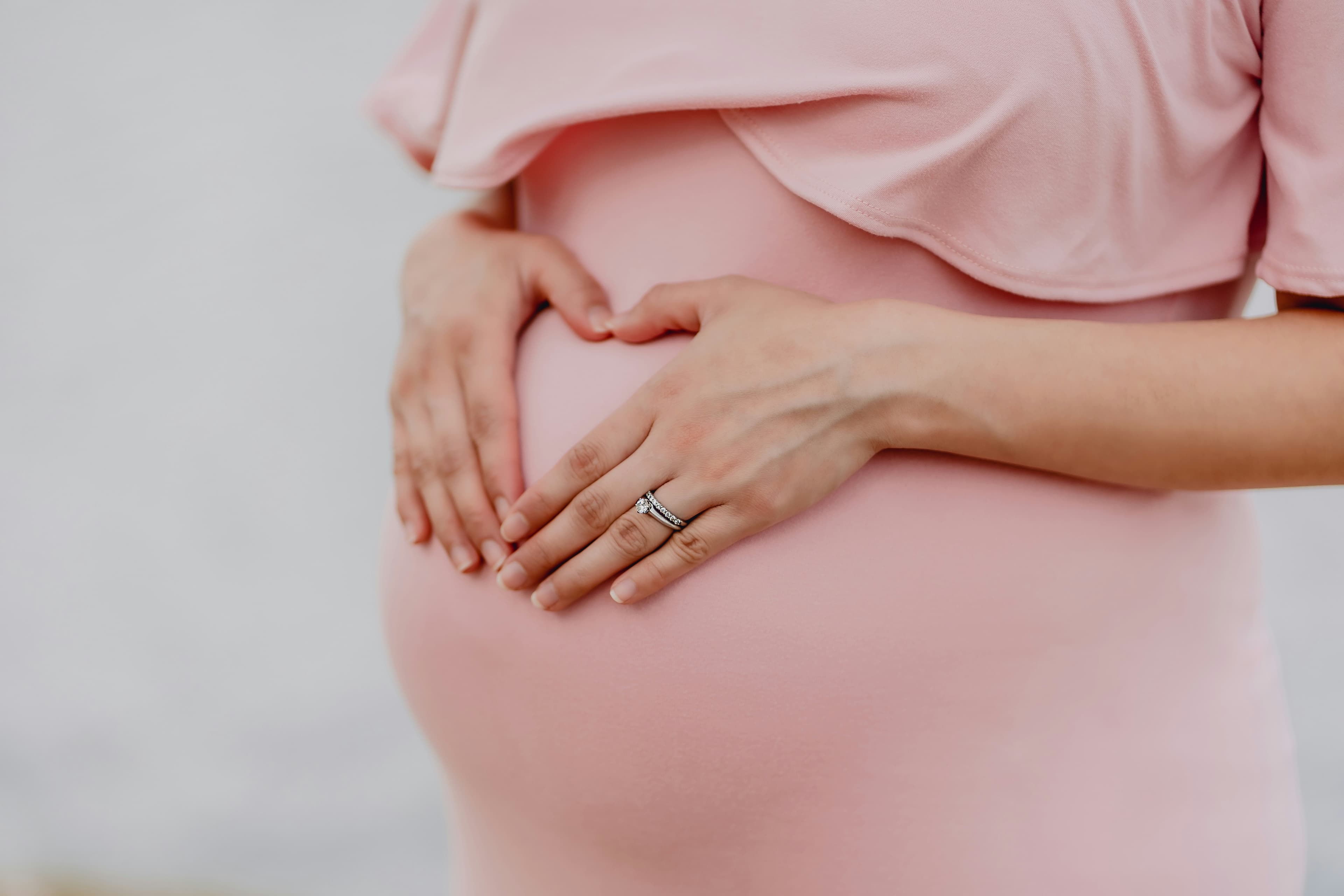Expectant mother receiving compassionate healthcare support